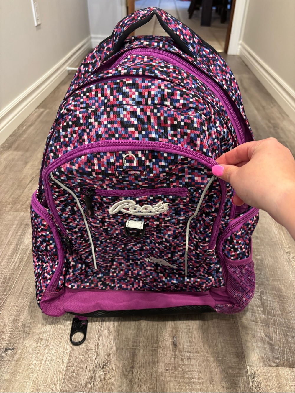 Roots Multicolor Pixel Backpack with Pink and Purple Accents